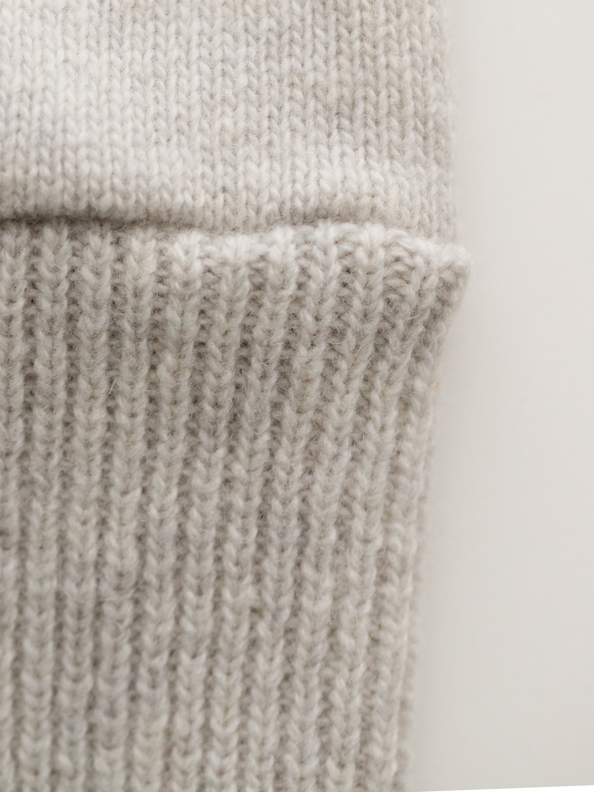 soft beige merino wool sweater dog