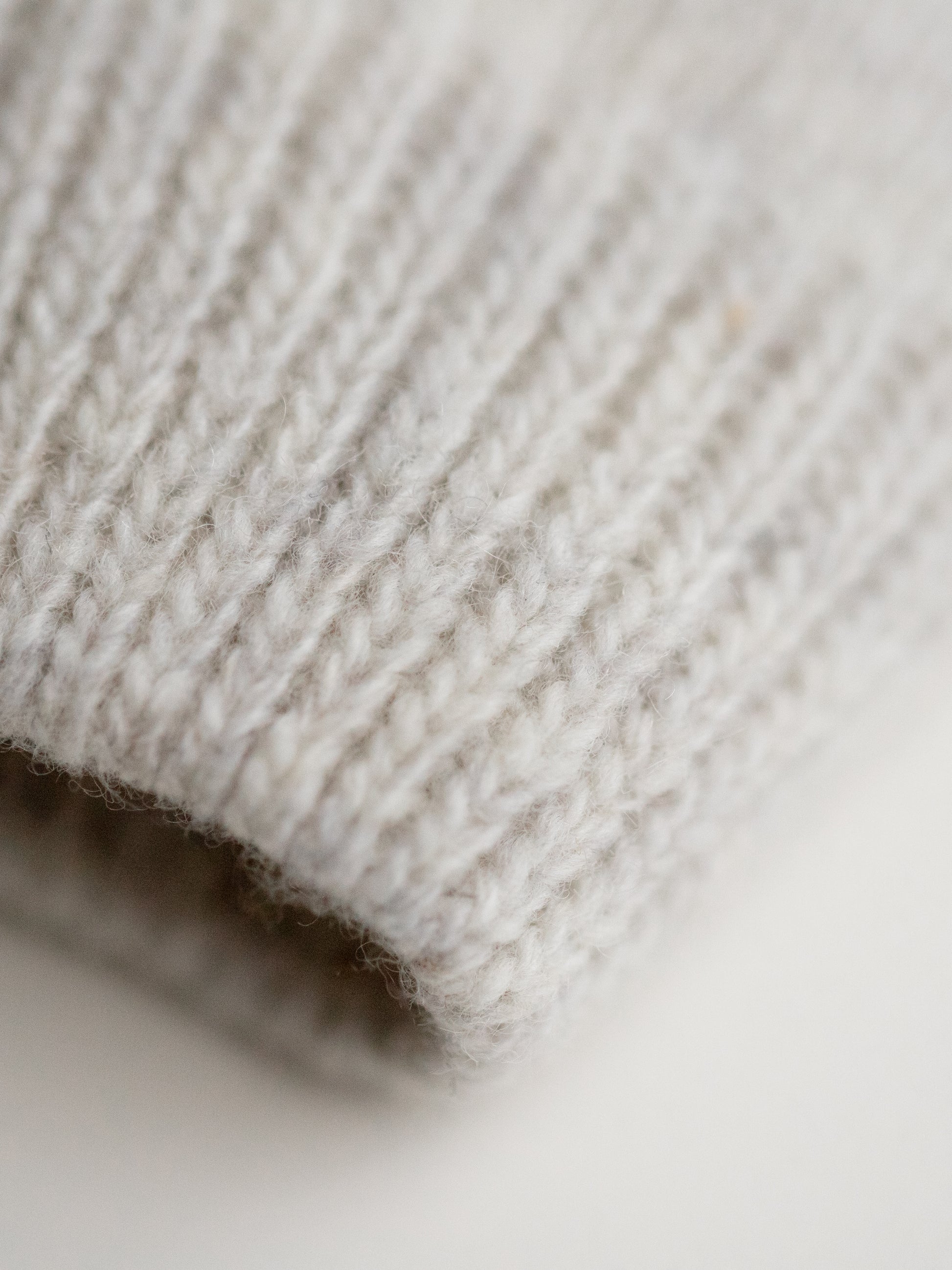 close up merino wool sweater poodle